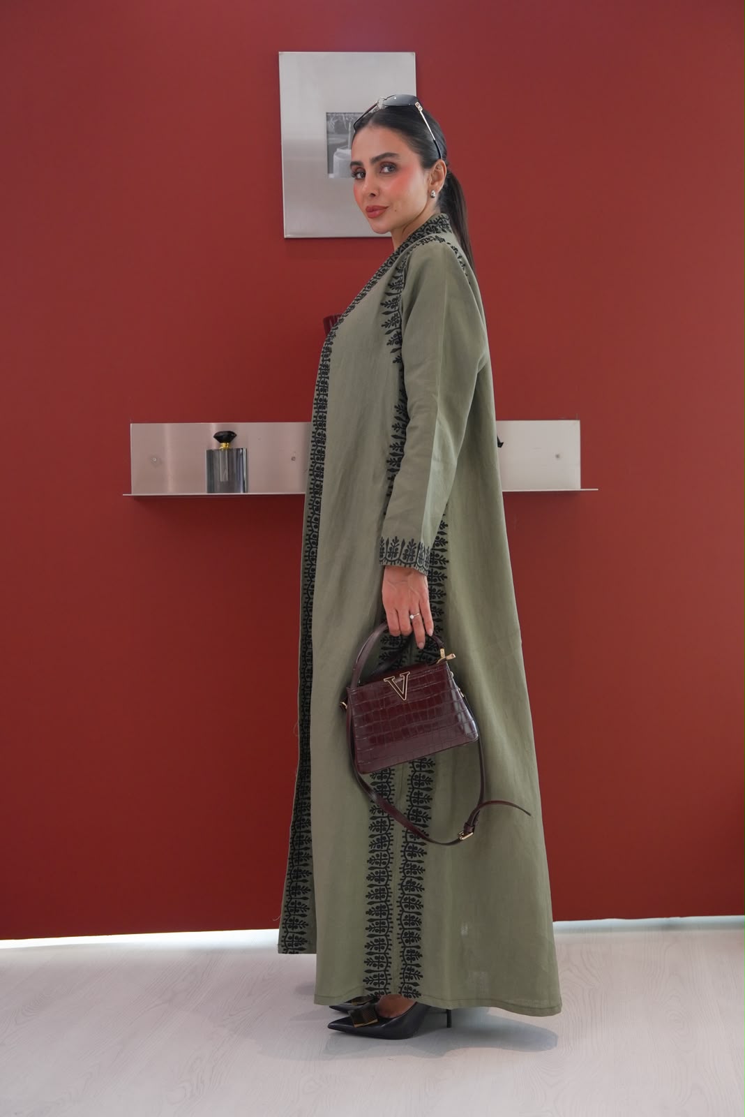 Linen abaya in olive green with embroidery.C:435