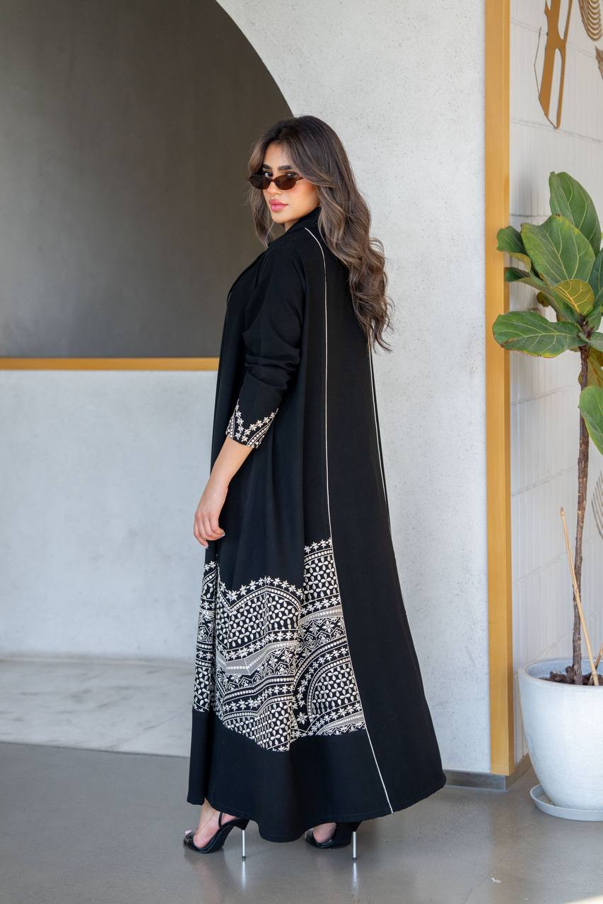 Black crepe abaya with white embroidery. C:384