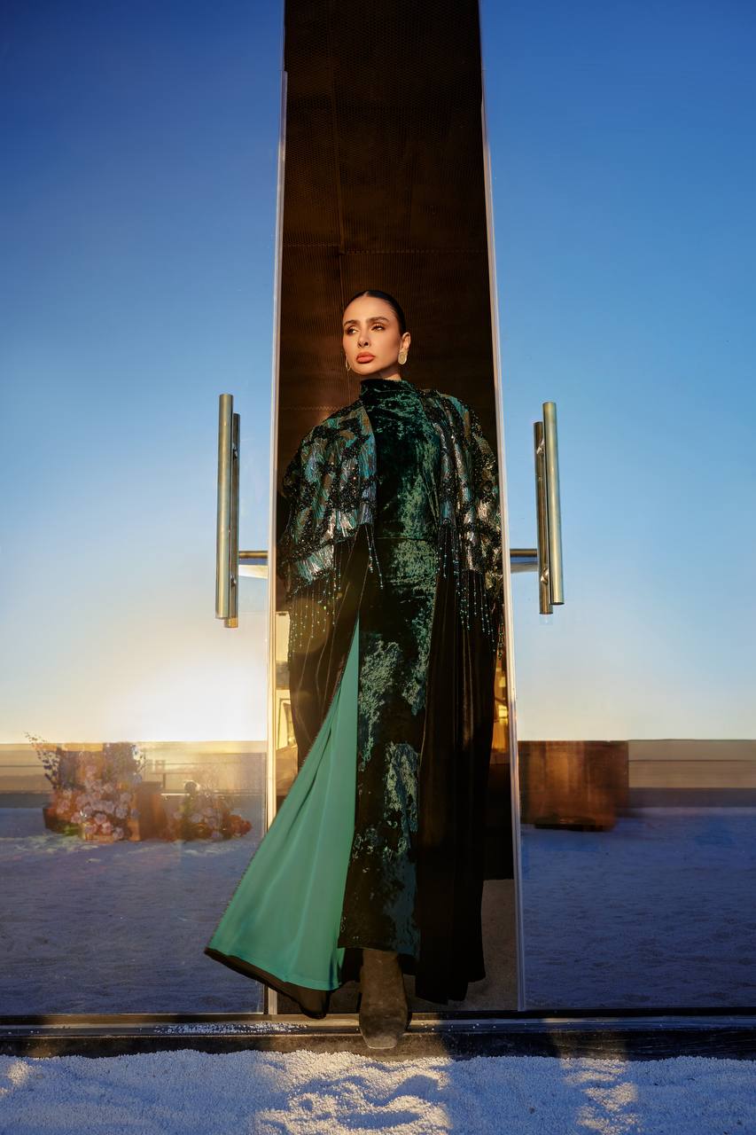 A bisht and dress set, made of velvet and jacquard fabric with hand-stitched details.C:373