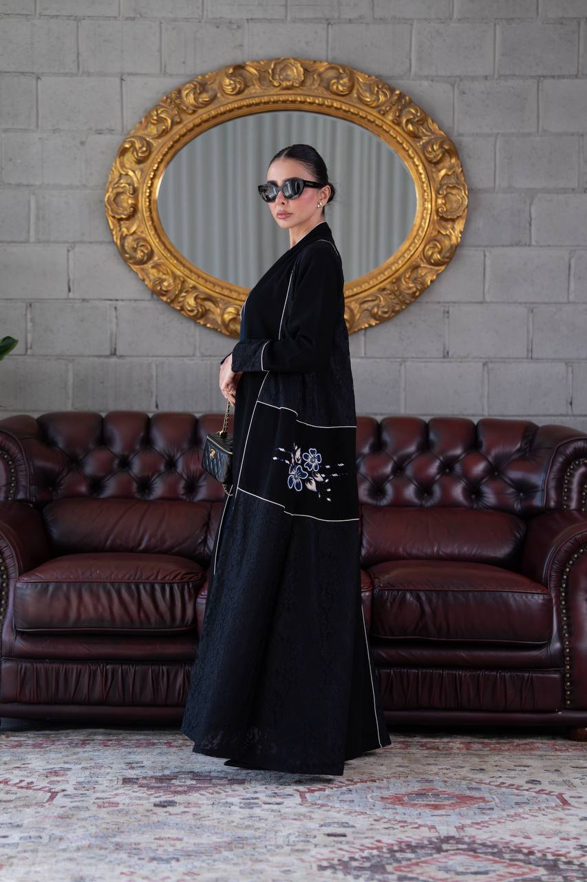 Black crepe abaya with lace trim and beading. C:394