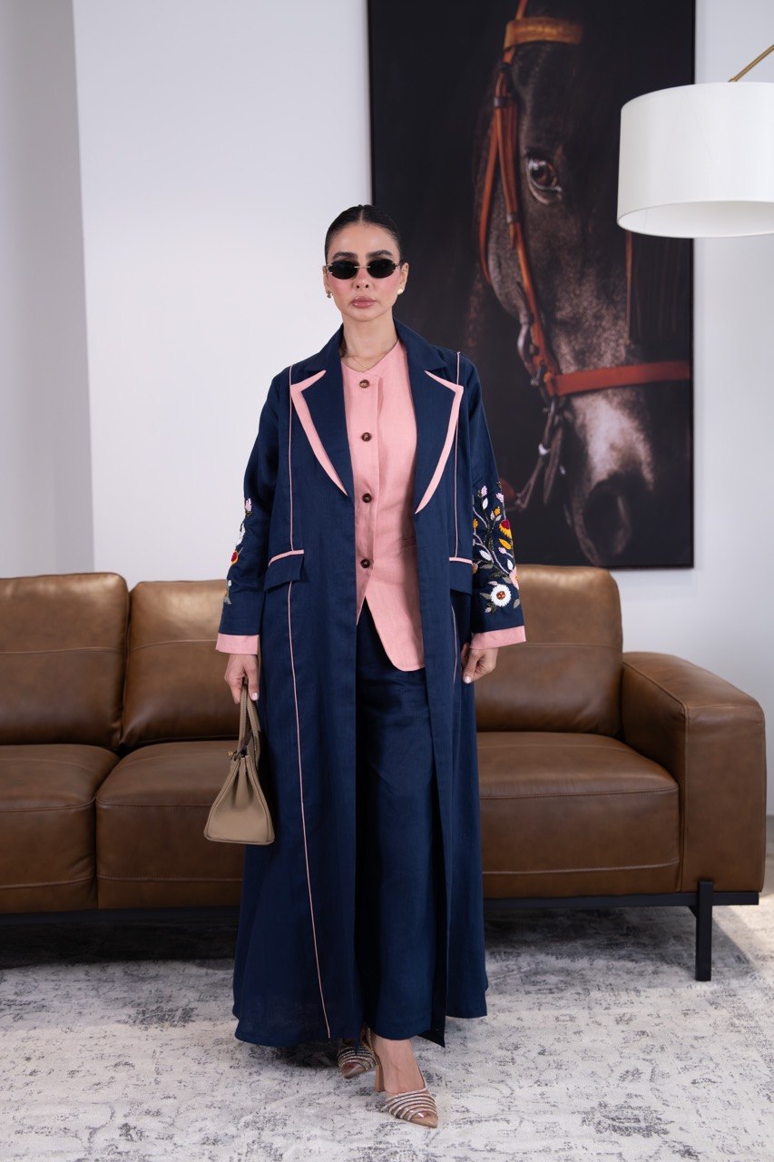 Linen abaya in navy blue with hand-stitched details. C:387