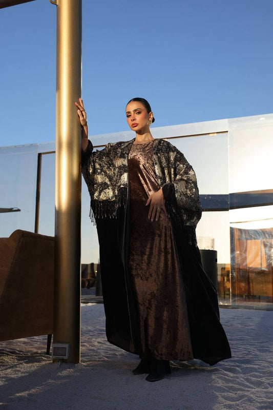 A bisht with a dress, made of jacquard and velvet with hand-stitched details.C:373