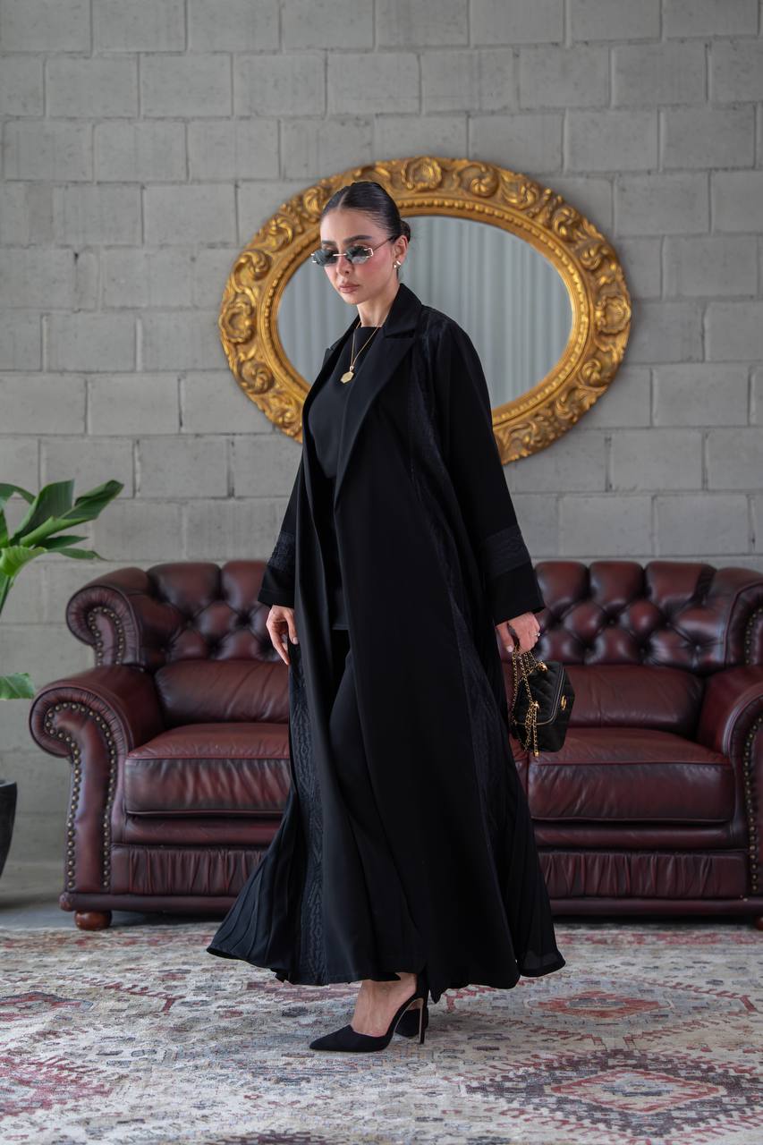 Crepe abaya with a flared skirt, embellished with beading and embroidery.C:392