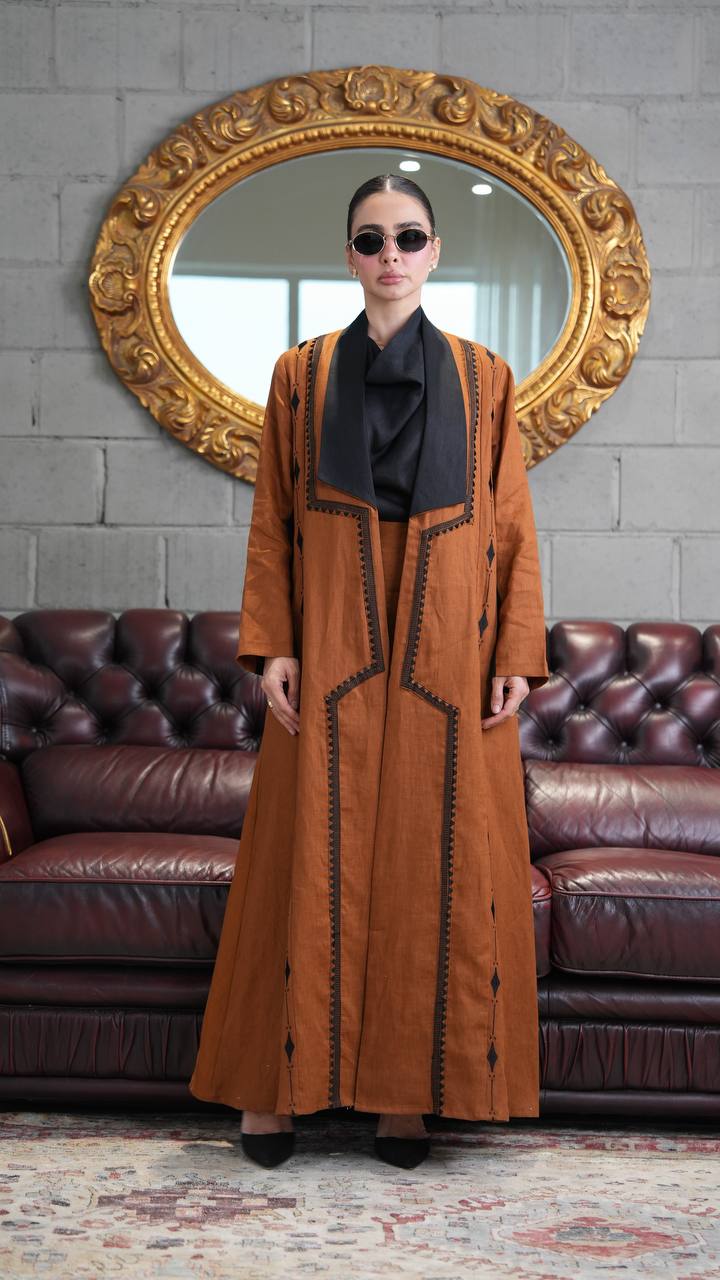 Camel-colored linen abaya with embroidery. C:388