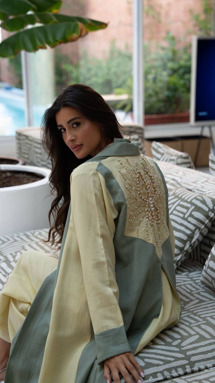 Linen abaya in yellow and pistachio green with hand-stitched details. C:406