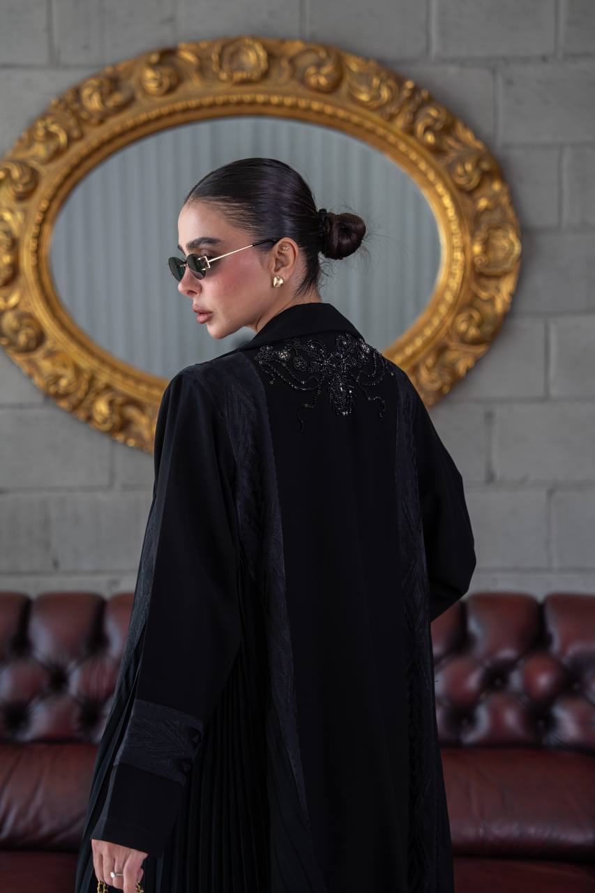Crepe abaya with a flared skirt, embellished with beading and embroidery.C:392