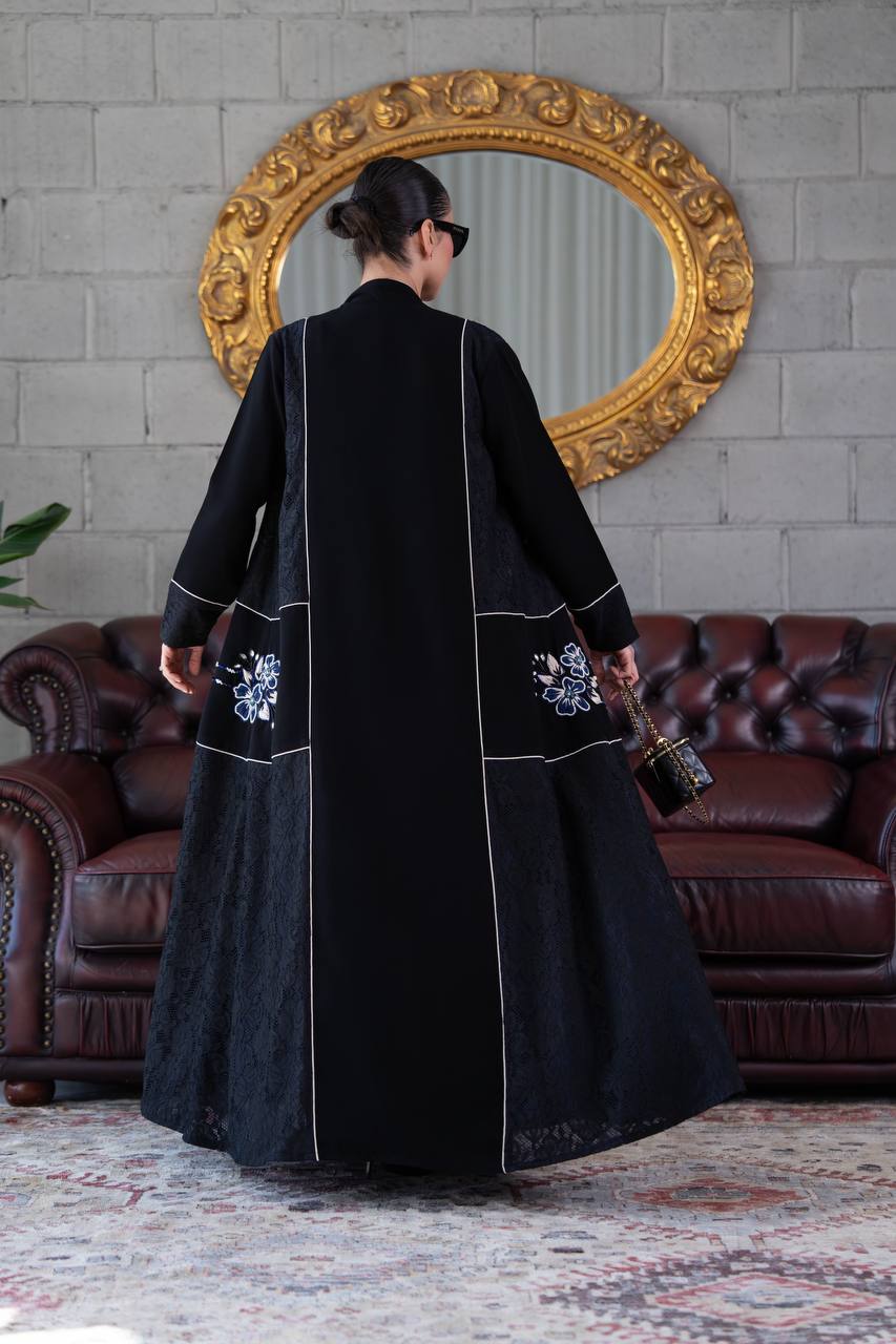 Black crepe abaya with lace trim and beading. C:394