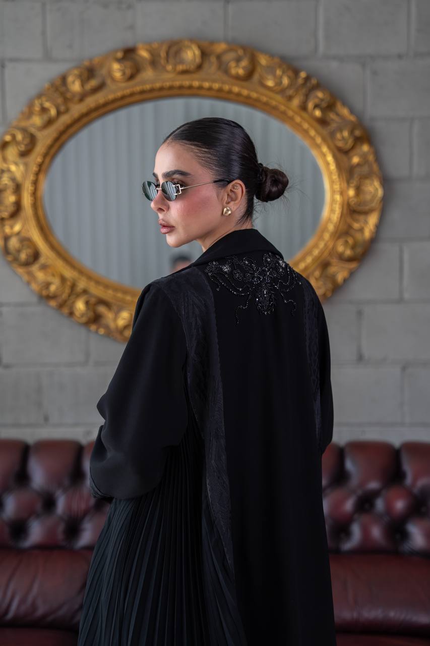 Crepe abaya with a flared skirt, embellished with beading and embroidery.C:392