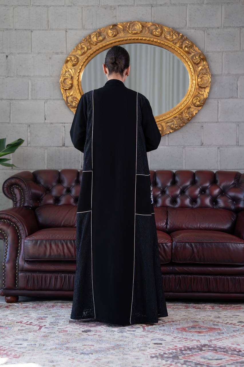 Black crepe abaya with lace trim and beading. C:394