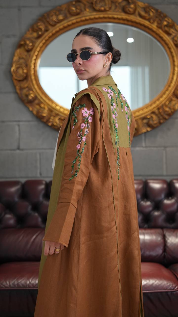 Camel-colored linen blazer abaya with hand-stitched details. C:396