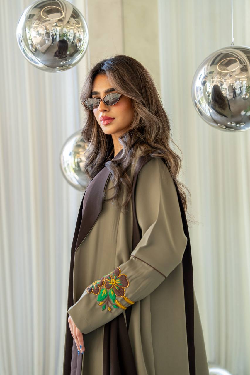 Olive green crepe abaya with hand-stitched details. C:386