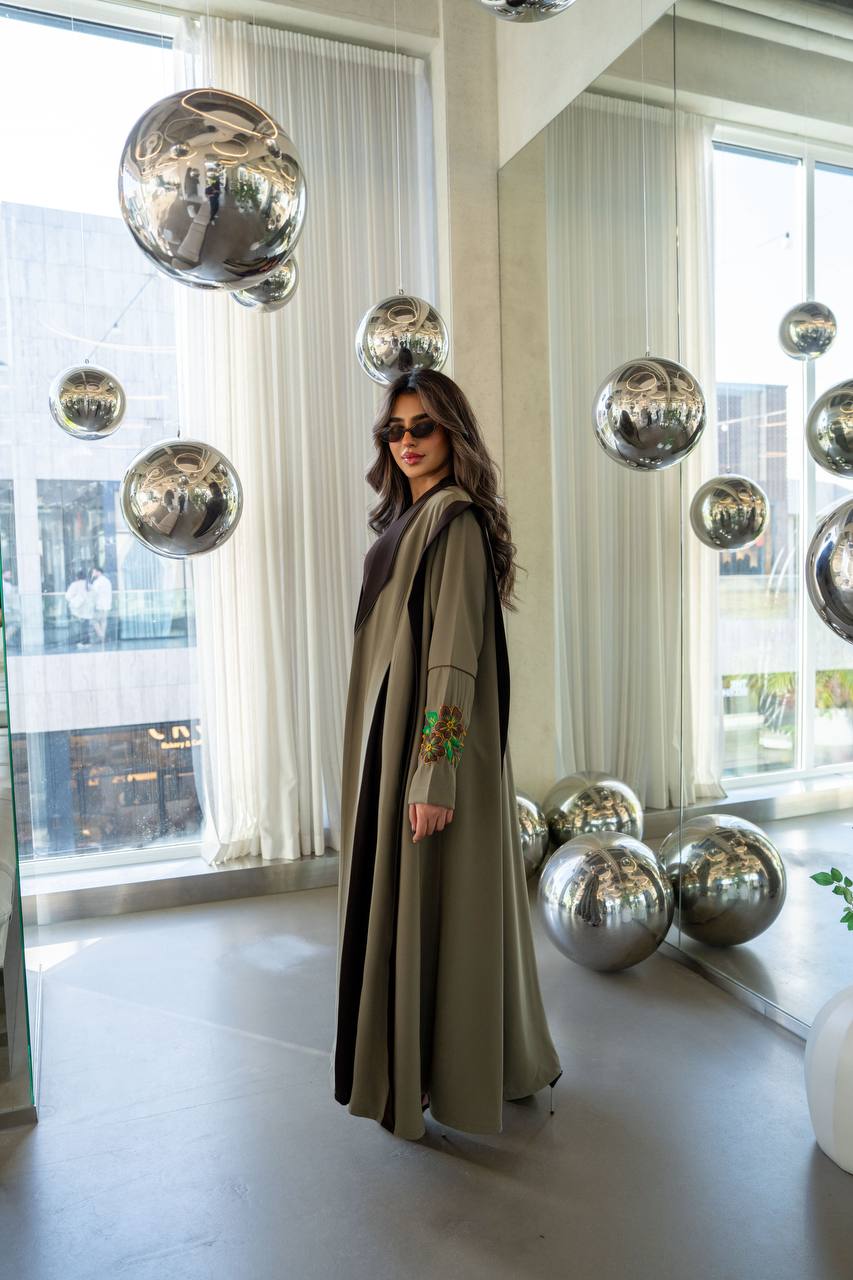 Olive green crepe abaya with hand-stitched details. C:386