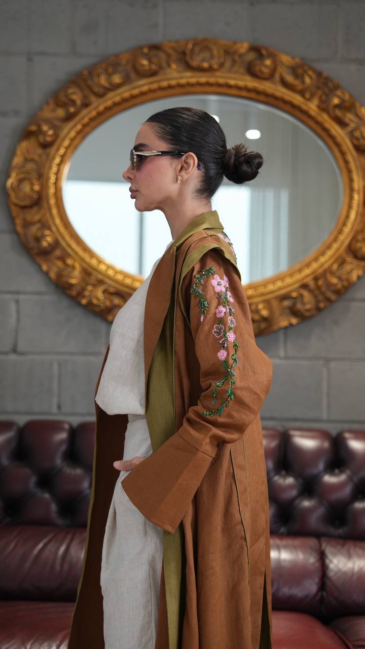 Camel-colored linen blazer abaya with hand-stitched details. C:396